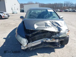 2006 Honda Civic LX with VIN 1HGFA16596L049500, listed as a IAAI auction lot 41801330 with 176,484 mi miles and . Bid and sale history available at DreamBid. Image 6.