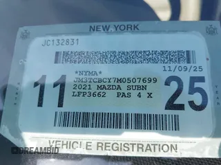 2021 Mazda CX-9 Touring with VIN JM3TCBCY7M0507699, listed as a IAAI auction lot 42603614 with 62,635 mi miles and . Bid and sale history available at DreamBid. Image 17.