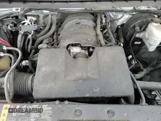 2018 Chevrolet Silverado 1500 LT with VIN 3GCUKREH2JG157394, listed as a Copart auction lot 71267495 with 113,568 mi miles and Salvage title. Bid and sale history available at DreamBid. Image 15.