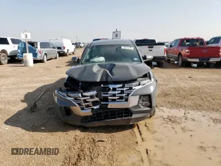 2023 Hyundai Santa Cruz SEL with VIN 5NTJBDAEXPH061824, listed as a Copart auction lot 59975255 with 56,492 mi miles and Salvage title. Bid and sale history available at DreamBid. Image 5.