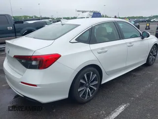 2022 Honda Civic EX with VIN JHMFE1F75NX009666, listed as a IAAI auction lot 42274513 with 25,290 mi miles and . Bid and sale history available at DreamBid. Image 4.