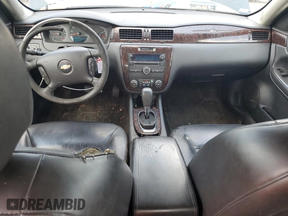 2016 Chevrolet Impala LTZ with VIN 2G1WC5E3XG1103239, listed as a Copart auction lot 61009445 with 203,758 mi miles and Salvage title. Bid and sale history available at DreamBid. Image 8.