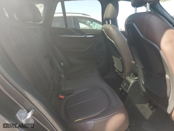 2017 BMW X1 xDrive28i with VIN WBXHT3Z33H4A54928, listed as a Copart auction lot 46987165 with 62,529 mi miles and Salvage Title. Bid and sale history available at carsss.com. Image 11.