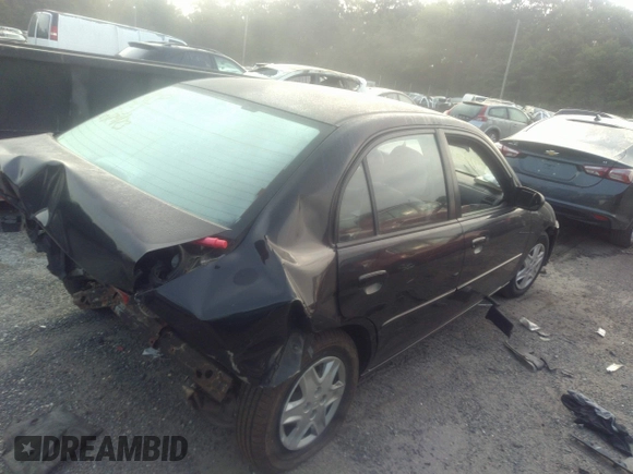 2003 Honda Civic LX with VIN 2HGES16563H602363, listed as a IAAI auction lot 40123995 with 165,413 mi miles. Bid and sale history available at carsss.com. Image 4.