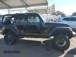 2021 Jeep Wrangler Unlimited Sport S with VIN 1C4HJXDN3MW681403, listed as a IAAI auction lot 41616298 with 40,526 mi miles and . Bid and sale history available at DreamBid. Image 12.