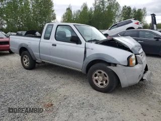 2002 Nissan Frontier z VIN 1N6DD26S02C360894, wystawiony jako Copart lot #54633205 z przebiegiem 239 440 mil mil oraz Szkoda całkowita • Salvage title. Historia ofert i sprzedaży dostępna na DreamBid. Obrazek 4.