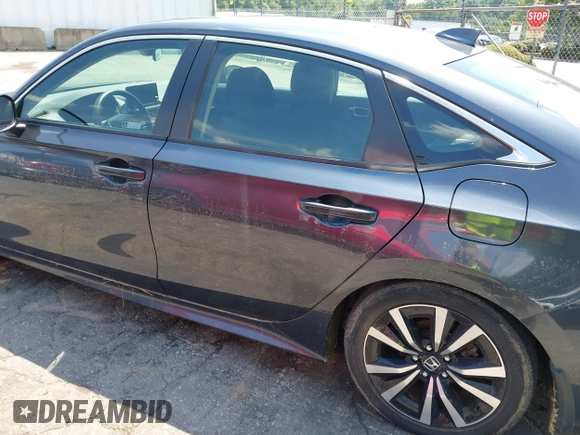 2023 Honda Civic EX with VIN 2HGFE1F75PH302414, listed as a IAAI auction lot 42680807 with 49,520 mi miles and . Bid and sale history available at DreamBid. Image 14.