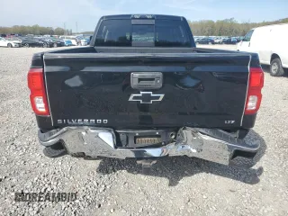 2017 Chevrolet Silverado 1500 LTZ with VIN 3GCUKSEJ9HG491930, listed as a Copart auction lot 51223025 with 128,251 mi miles and Salvage Title. Bid and sale history available at DreamBid. Image 6.