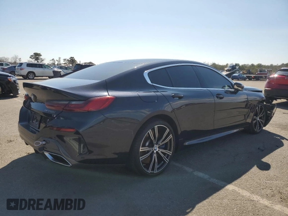 2020 BMW 8 Series M850i with VIN WBAGV8C02LCE34594, listed as a Copart auction lot 50389675 with 37,279 mi miles and Salvage title. Bid and sale history available at DreamBid. Image 3.
