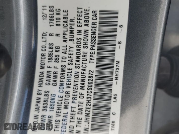 2012 Honda Insight z VIN JHMZE2H37CS002872, wystawiony jako Copart lot #48338685 z przebiegiem Nie podano mil oraz Szkoda całkowita • Salvage title. Historia ofert i sprzedaży dostępna na DreamBid. Obrazek 12.