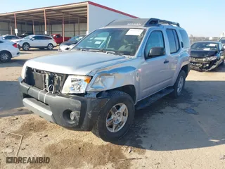 2005 Nissan Xterra S with VIN 5N1AN08W25C640551, listed as a IAAI auction lot 41243383 with 166,948 mi miles. Bid and sale history available at carsss.com. Image 2.