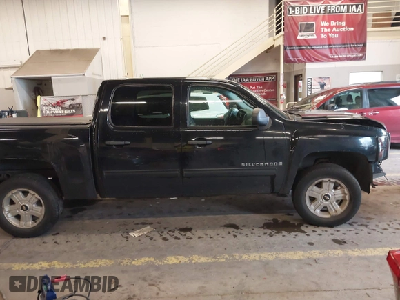 2009 Chevrolet Silverado 1500 LT with VIN 3GCEK23329G114477, listed as a IAAI auction lot 41653641 with 163,105 mi miles and . Bid and sale history available at DreamBid. Image 13.
