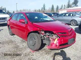 2011 Toyota Corolla L with VIN 2T1BU4EE2BC634962, listed as a IAAI auction lot 41966964 with 165,115 mi miles. Bid and sale history available at carsss.com. Image 1.