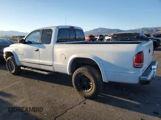 1998 Dodge Dakota SLT with VIN 1B7GG22Y1WS544271, listed as a Copart auction lot 88781885 with 149,417 mi miles and Salvage Title. Bid and sale history available at carsss.com. Image 2.