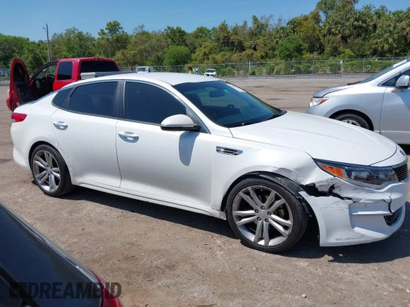 2016 Kia Optima LX with VIN KNAGT4L32G5085128, listed as a IAAI auction lot 42016728 with 259,218 mi miles. Bid and sale history available at carsss.com. Image 13.