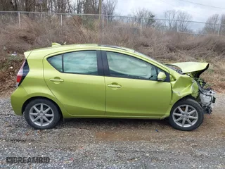 2015 Toyota Prius c One with VIN JTDKDTB38F1114272, listed as a IAAI auction lot 41224252 with 59,717 mi miles. Bid and sale history available at carsss.com. Image 14.