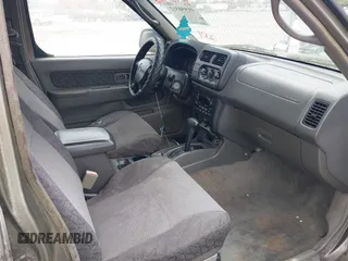 2001 Nissan Xterra XE z VIN 5N1ED28T51C588588, wystawiony jako IAAI lot #41950312 z przebiegiem 258 890 mil mil oraz . Historia ofert i sprzedaży dostępna na DreamBid. Obrazek 5.