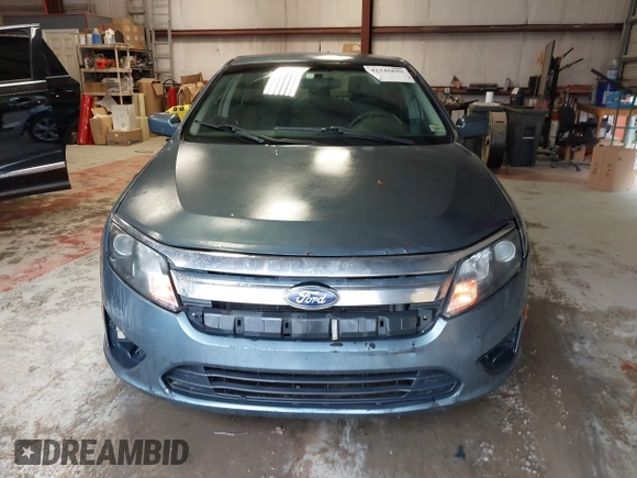 2012 Ford Fusion SE z VIN 3FAHP0HA8CR298495, wystawiony jako IAAI lot #42245859 z przebiegiem 192 979 mil mil oraz . Historia ofert i sprzedaży dostępna na DreamBid. Obrazek 12.
