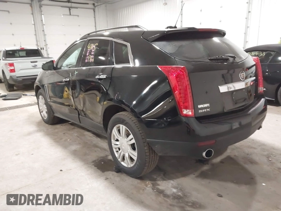 2015 Cadillac SRX with VIN 3GYFNAE36FS519604, listed as a IAAI auction lot 41215296 with 70,954 mi miles and . Bid and sale history available at DreamBid. Image 3.
