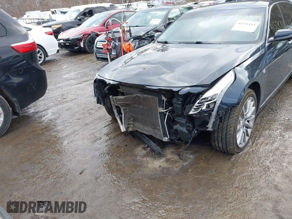 2017 Cadillac CT6 Luxury AWD with VIN 1G6KD5RS4HU165765, listed as a IAAI auction lot 41526164 with 114,974 mi miles and . Bid and sale history available at DreamBid. Image 6.