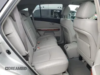2007 Lexus RX 350 z VIN 2T2HK31U37C044795, wystawiony jako Copart lot #59156565 z przebiegiem 223 845 mil mil oraz Czysty tytuł • Clean title. Historia ofert i sprzedaży dostępna na DreamBid. Obrazek 11.