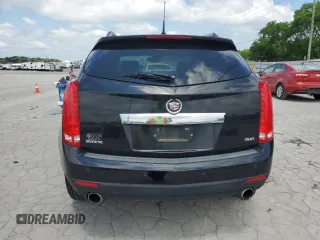 2014 Cadillac SRX Luxury Collection z VIN 3GYFNBE38ES527370, wystawiony jako Copart lot #55518735 z przebiegiem 141 379 mil mil oraz Szkoda całkowita • Salvage title. Historia ofert i sprzedaży dostępna na DreamBid. Obrazek 6.