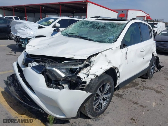 2018 Toyota RAV4 XLE with VIN JTMWFREV0JD132042, listed as a IAAI auction lot 41578567 with 102,365 mi miles. Bid and sale history available at carsss.com. Image 2.
