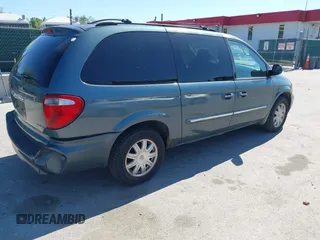 2007 Chrysler Town & Country LWB Touring with VIN 2A4GP54L47R167189, listed as a IAAI auction lot 42143590 with 165,547 mi miles. Bid and sale history available at carsss.com. Image 4.