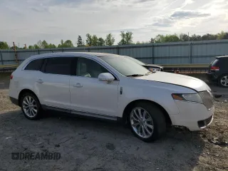 2012 Lincoln MKT EcoBoost with VIN 2LMHJ5AT7CBL50296, listed as a Copart auction lot 53883455 with 127,296 mi miles and Clean Title. Bid and sale history available at DreamBid. Image 4.