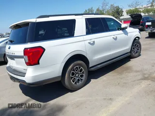 2023 Ford Expedition Max XLT z VIN 1FMJK1H85PEA63621, wystawiony jako IAAI lot #42229772 z przebiegiem 21 879 mil mil oraz . Historia ofert i sprzedaży dostępna na DreamBid. Obrazek 4.