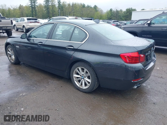 2015 BMW 5 Series 528i xDrive with VIN WBA5A7C59FG142685, listed as a IAAI auction lot 42181388 with 124,482 mi miles and . Bid and sale history available at DreamBid. Image 3.