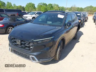 2023 Honda CR-V Sport Touring with VIN 2HKRS6H97PH804042, listed as a IAAI auction lot 42041207 with 19,152 mi miles and . Bid and sale history available at DreamBid. Image 17.