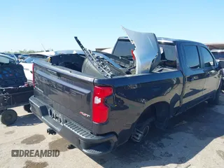 2022 Chevrolet Silverado 1500 RST with VIN 3GCPADED4NG614504, listed as a IAAI auction lot 41819300 with Not Provided miles and . Bid and sale history available at DreamBid. Image 4.