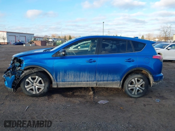 2018 Toyota RAV4 LE with VIN JTMBFREV4JJ717092, listed as a IAAI auction lot 41492235 with 127,643 mi miles. Bid and sale history available at carsss.com. Image 14.