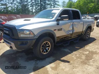 2016 Ram 1500 Rebel z VIN 1C6RR7YT7GS185173, wystawiony jako IAAI lot #42033684 z przebiegiem 152 758 mil mil oraz . Historia ofert i sprzedaży dostępna na DreamBid. Obrazek 17.