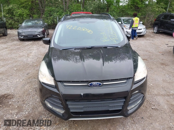 2014 Ford Escape SE with VIN 1FMCU9G9XEUD39077, listed as a IAAI auction lot 42205040 with 92,355 mi miles and . Bid and sale history available at DreamBid. Image 6.
