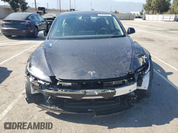 2025 Tesla Model 3 Long Range with VIN 5YJ3E1EA8SF896333, listed as a Copart auction lot 61876445 with 5,690 mi miles and Salvage title. Bid and sale history available at DreamBid. Image 5.