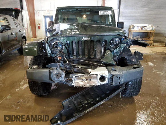 2011 Jeep Wrangler Unlimited Sahara with VIN 1J4BA5H17BL592752, listed as a Copart auction lot 83344334 with 176,259 mi miles and Clean Title. Bid and sale history available at carsss.com. Image 5.