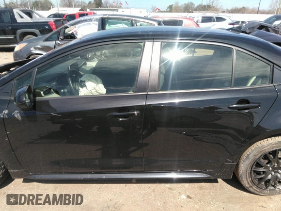 2021 Toyota Corolla LE with VIN JTDEPMAE5MJ126390, listed as a IAAI auction lot 41669331 with 77,398 mi miles. Bid and sale history available at carsss.com. Image 14.