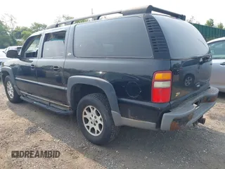 2003 Chevrolet Suburban Z71 with VIN 3GNFK16T23G325753, listed as a IAAI auction lot 42409253 with 247,494 mi miles and . Bid and sale history available at DreamBid. Image 3.