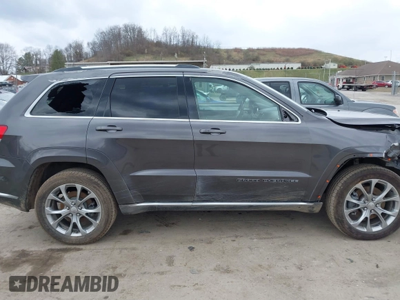 2020 Jeep Grand Cherokee Summit with VIN 1C4RJFJT2LC408499, listed as a IAAI auction lot 41854021 with 78,189 mi miles and . Bid and sale history available at DreamBid. Image 14.