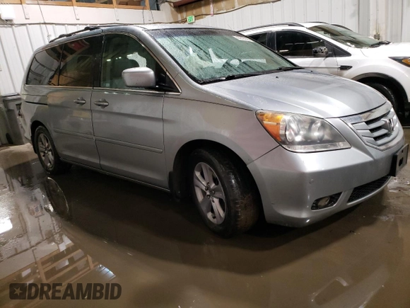 2008 Honda Odyssey Touring z VIN 5FNRL38918B104500, wystawiony jako Copart lot #47816145 z przebiegiem 262 179 mil mil oraz Szkoda całkowita • Salvage title. Historia ofert i sprzedaży dostępna na DreamBid. Obrazek 4.