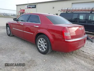 2006 Chrysler 300 C with VIN 2C3LA63H26H421354, listed as a IAAI auction lot 41706454 with 113,647 mi miles. Bid and sale history available at carsss.com. Image 3.