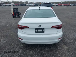 2021 Volkswagen Jetta S z VIN 3VWC57BU7MM098161, wystawiony jako IAAI lot #41954687 z przebiegiem 42 161 mil mil oraz . Historia ofert i sprzedaży dostępna na DreamBid. Obrazek 17.