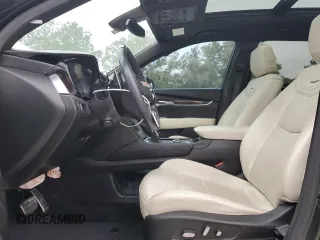 2023 Cadillac XT6 AWD Sport z VIN 1GYKPGRS6PZ126039, wystawiony jako Copart lot #55948605 z przebiegiem 39 966 mil mil oraz Szkoda całkowita • Salvage title. Historia ofert i sprzedaży dostępna na DreamBid. Obrazek 7.