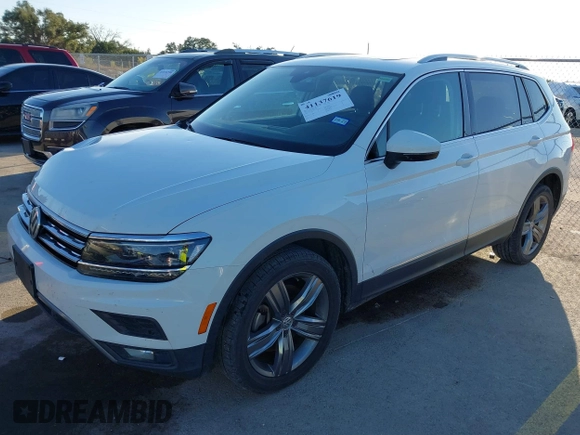 2018 Volkswagen Tiguan SEL Premium with VIN 3VV5B7AX2JM202908, listed as a IAAI auction lot 41137619 with 84,323 mi miles and . Bid and sale history available at DreamBid. Image 2.