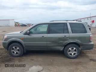 2008 Honda Pilot EX-L with VIN 5FNYF18588B012708, listed as a IAAI auction lot 42562336 with 223,992 mi miles and . Bid and sale history available at DreamBid. Image 14.