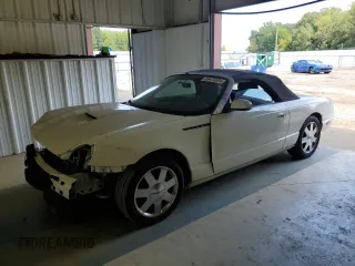 2002 Ford Thunderbird Hardtop Premium z VIN 1FAHP60A52Y130277, wystawiony jako Copart lot #69473594 z przebiegiem Nie podano mil oraz Szkoda całkowita • Salvage title. Historia ofert i sprzedaży dostępna na DreamBid. Obrazek 1.
