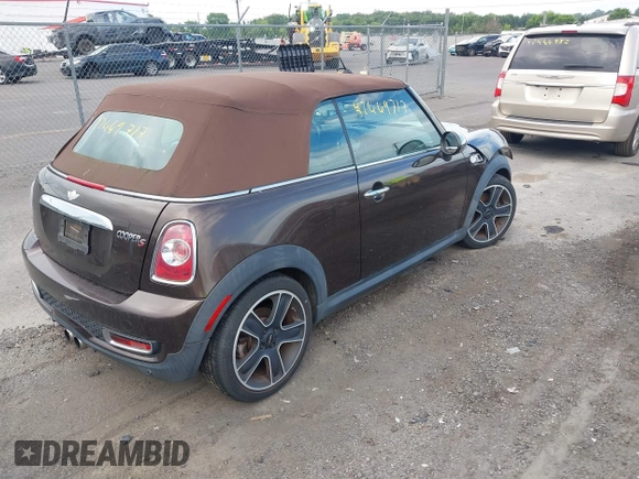 2011 MINI Convertible S with VIN WMWZP3C50BTX84044, listed as a IAAI auction lot 42669717 with Not provided miles and . Bid and sale history available at DreamBid. Image 4.
