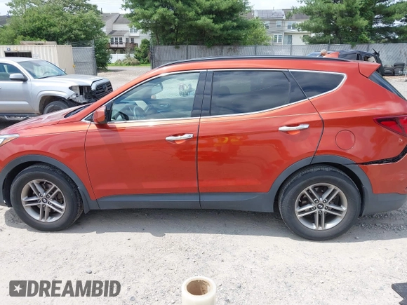 2017 Hyundai Santa Fe 2.4L z VIN 5XYZUDLB1HG463416, wystawiony jako IAAI lot #42546637 z przebiegiem 81 963 mil mil oraz . Historia ofert i sprzedaży dostępna na DreamBid. Obrazek 14.